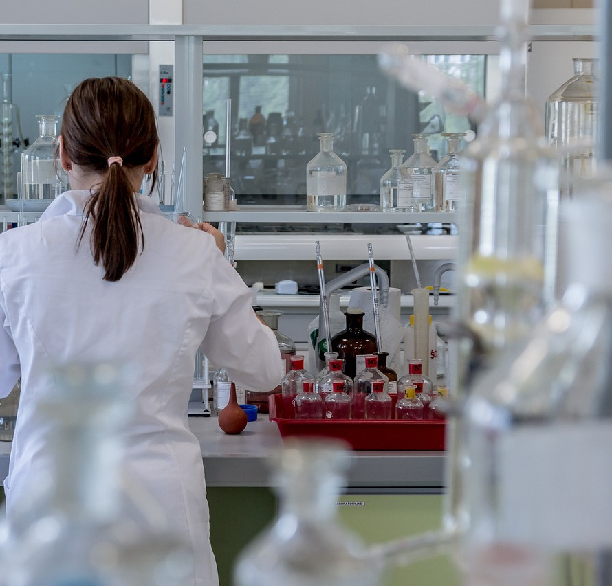 scientist pipette genetics lab